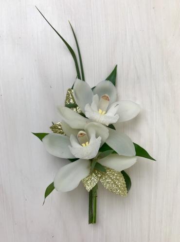 White Cymbid Orchids with Goldleaf Boutonniere